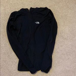black zip up north face jacket